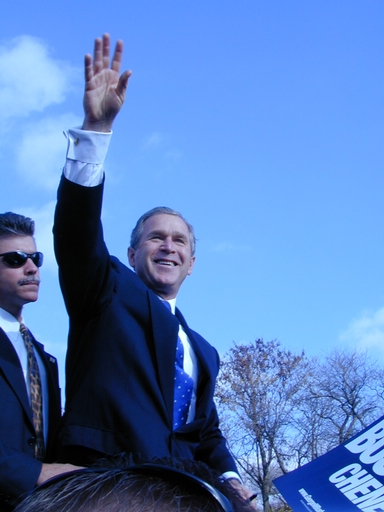 George W. Bush waves to the crowd
