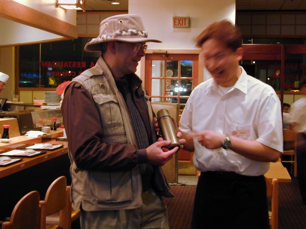 Japanese waiter explains Titanium Thermos Bottle to Marty